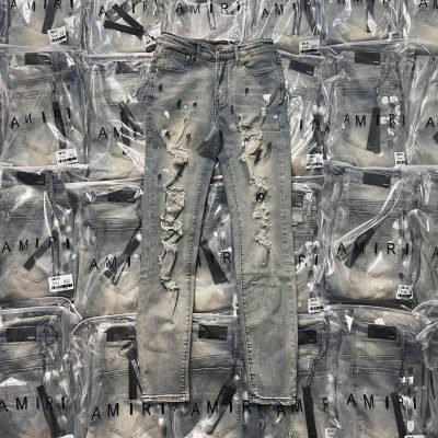 Luxury Ami Trousers Blue Denim Distressed Collection