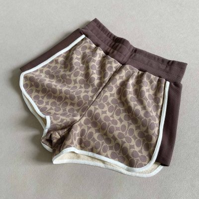 Luxury Coach Shorts Brown Cotton Graphic Collection